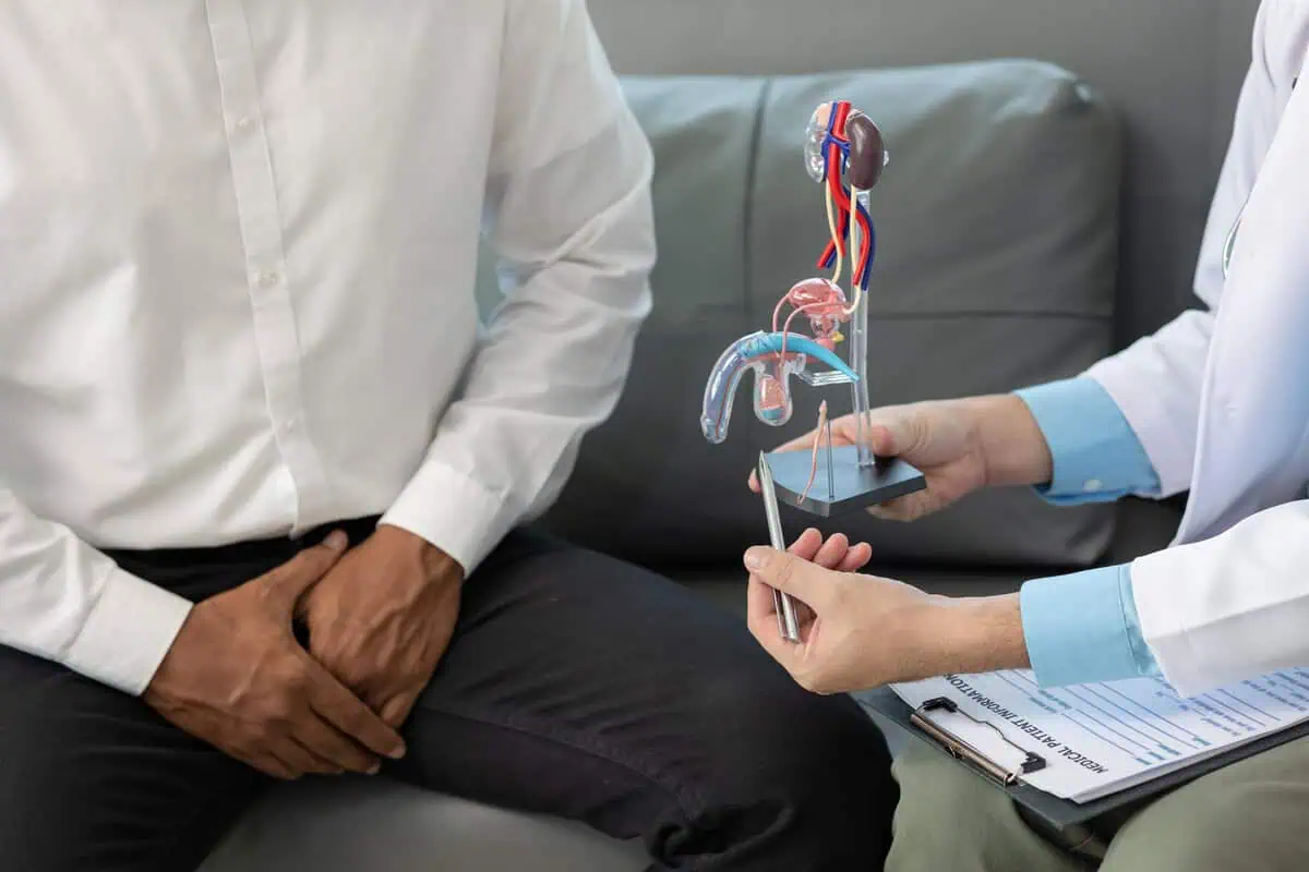 Male patient discussing sexual health concerns with a healthcare provider in St. Louis, MO.